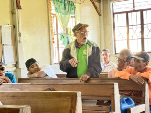 An elder shares personal experiences and insights on protecting community rights and culture.